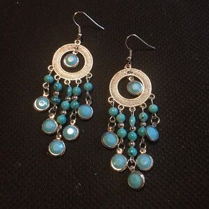Blue and silver earrings with turquoise colored stones